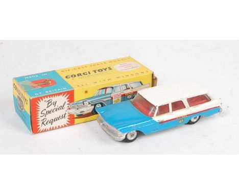 A Corgi Toys No. 443 Plymouth US Mail car, comprising of white red, and blue body with spun hubs and US Mail transfers to sid