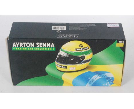 A Minichamps Model No. 901827 1/18 scale model of an Ayrton Senna Maclaren MP4/5B 1990 Formula One race car housed in the ori