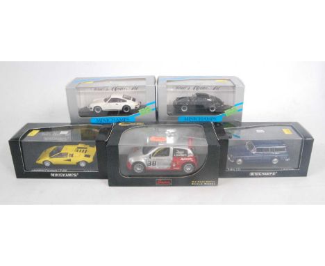 A collection of various boxed Minichamps and Saico racing and classic saloons to include a Minichamps Volvo 121, a Minichamps