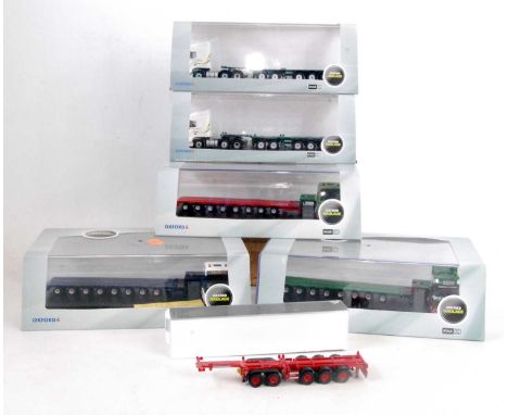 Two boxes containing a quantity of mainly Oxford 1/76 scale commercial vehicles and accessories, mixed examples to include a 