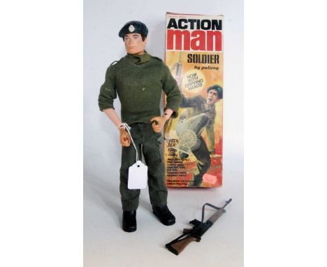 An Action Man catalogue  No. 34052 Soldier, comprising of Action Man figure with gripping hands, military overall, assault ri