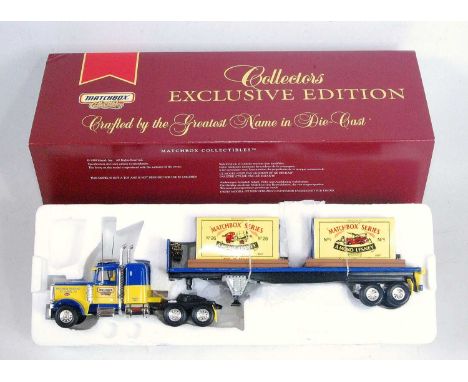 A Matchbox No. DYM92127 Peterbilt Truck and Commemorative Tractor Trailer gift set, housed in the original box with white car