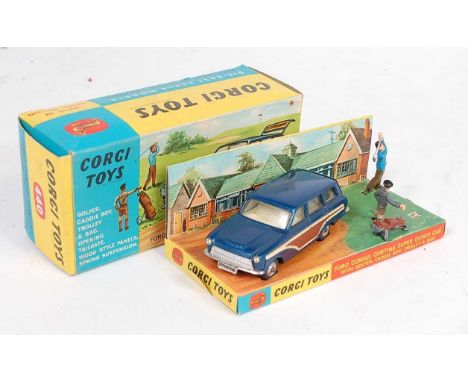 A Corgi Toys No. 440 Ford Consul Cortina Super estate car comprising of dark metallic blue body with brown and white side pan