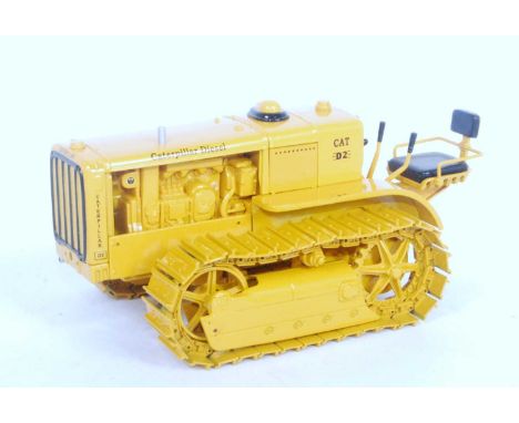 A Spec Cast 1/16 scale diecast model of a Caterpillar D2 track type tractor 5U series Orchard Model in the original polystyre