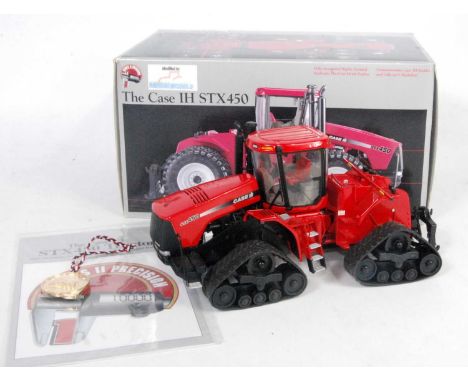 An ERTL Precision series 1/32 scale model of a Case IHSTX 450 tractor, later converted by Agriam Models to a track type examp