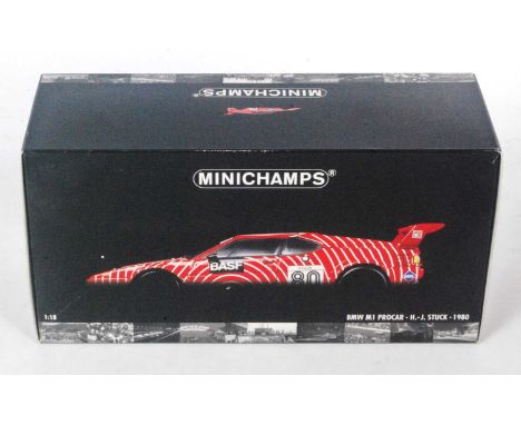 A Minichamps Model No. 802980 1/18 scale model of an HJ Stuck 1980 BMW M1 Pro-cast finished in red and white with racing No. 