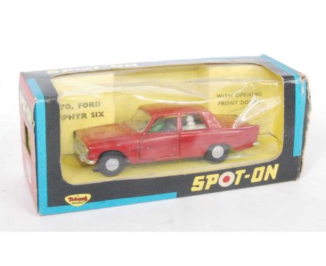 A Spot-On Models No. 270 Ford Zephyr 6 comprising red body with lady driver figure and poodle to back seats, fitted with spun