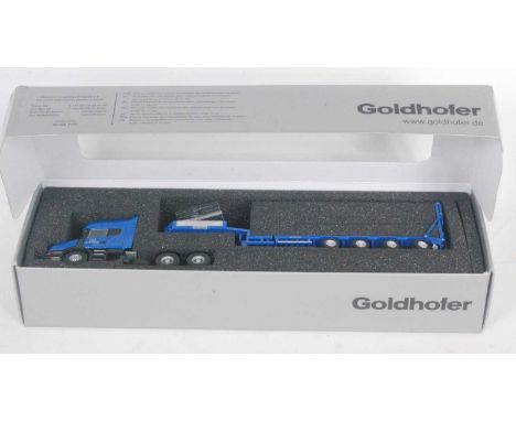 A Tekno 1/50 scale Goldhofer model of a Scania T586 x 2 tractor unit, with four axle Goldhofer trailer, both finished in blue