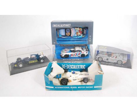 Five various modern release and vintage plastic cased and boxed Scalextric racing cars, to include Ref. Nos. C3855, C3838, C0