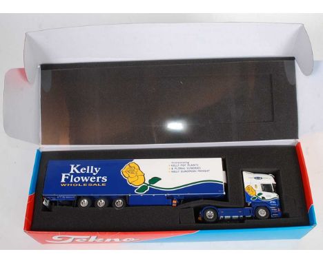 A Tekno 1/50 scale boxed diecast model of a Kelly Flowers Wholesale Scania R500 tractor unit with refrigerator trailer, compl