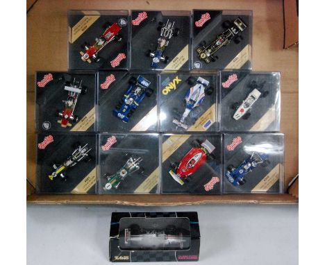 12 various boxed/plastic cased Onyx and Quartzo 1/43 scale F1 racing diecasts, mixed examples to include Gold Leaf Graham Hil