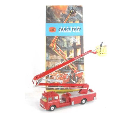 A Corgi Toys No. 1127 Simon Snorkel fire engine comprising of red body with yellow interior and firemen figures, with instruc