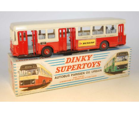 A French Dinky Toys No. 889 Parisian Urban Autobus comprising of red and cream body with Dunlop livery, complete with red hub