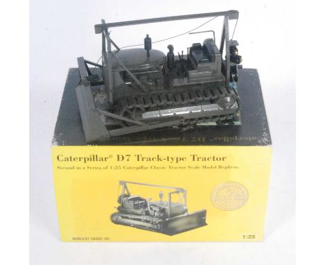 A Norscot model No. 386 1/25 scale model of a Caterpillar D7 track type tractor, military issue, with certificate of authenti