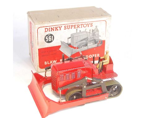 A Dinky Toys No. 561 Blaw Knox bulldozer comprising red body with tan driver and green tracks, housed in the original buff co