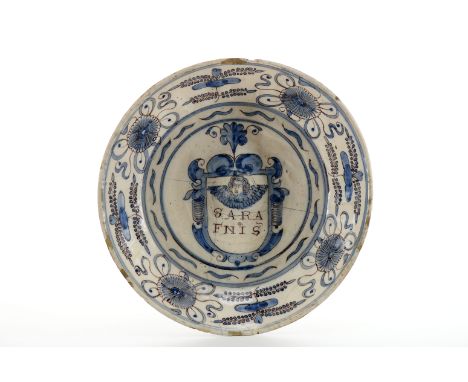 A basin, faience, blue and vinous «Spiders» decoration "Shield containing cherub and inscription SARAFNIS (sic)" attributed t