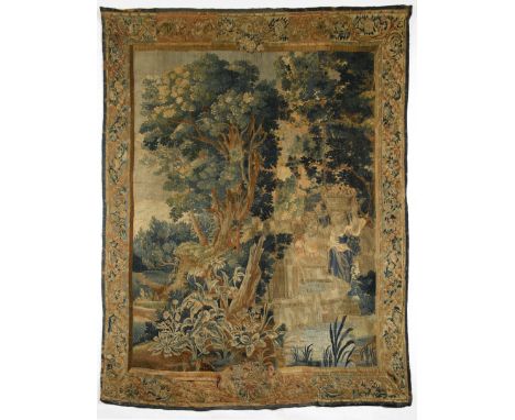 A tapestry "Female figures by the fountain", polychrome wool yarn, polychrome bordure "Flowers", Flemish, 17th/18th C., fault