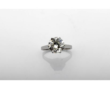 A ring, gold, set with an old brilliant cut diamond weighing approximately 3.20 ct., colour grade K~L and purity SI, 20th C. 