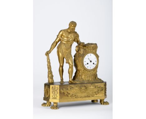 A table clock, Empire, gilt bronze en relief "Hercules", white enamel dial with black Roman numerals, base en relief "Lion's 