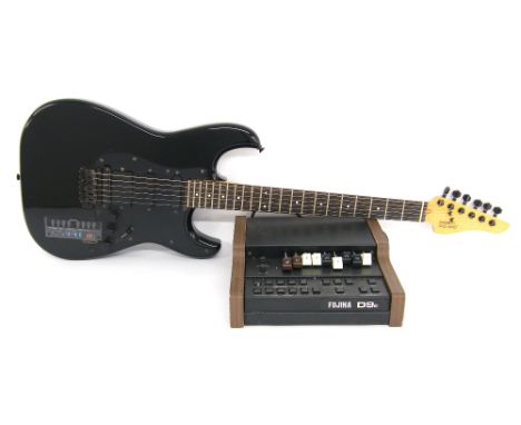 Mark Griffiths' Casio PG310 guitar synth, black finish with some imperfections, electrics in working order although midi unte