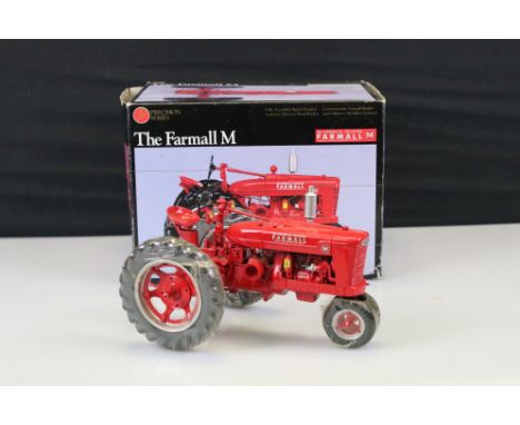 Ertl The Farmall M Mc Cormick - Deering Precision Series Tractor model in original box. Model VG, box VG.