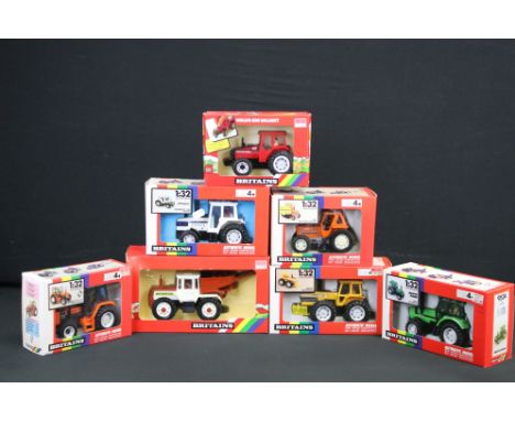 Seven boxed Britains 1:32 scale diecast model tractors to include 9523 Fiat Half-Track Tractor, 9521 County 1884 Tractor, 952