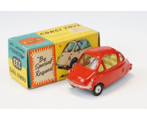 Boxed Corgi 233 Heinkel Economy Car diecast model in red, diecast in a gd play worn condition, box vg