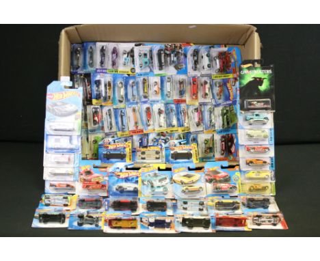 Around 80 carded Mattel Hot Wheels diecast models, featuring Ghostbusters, HW Race, HW City, 2008 First Editions, etc. (Cards