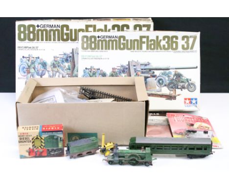 Two boxed Tamiya 1/35 scale 88mm Gun Flak36/37 military plastic model kits to include 35017 and MM117 variants, both unbuilt 