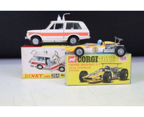 Two boxed diecast models to include Corgi 159 Cooper Maserati F1 in yellow with instructions (excellent) and Dinky 254 Police