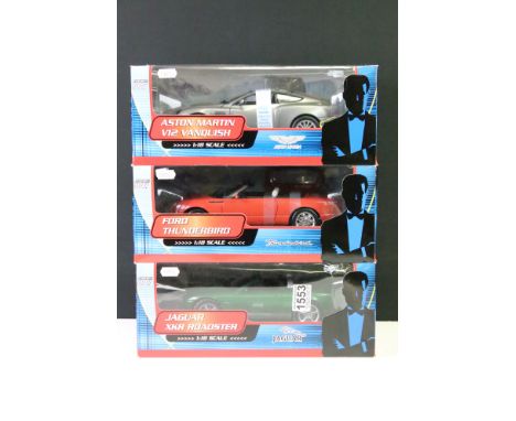 Three boxed James Bond 007 40th Anniversary 1:18 scale models to include 10011 Aston Martin V12 Vanquish, 10012 Ford Thunderb