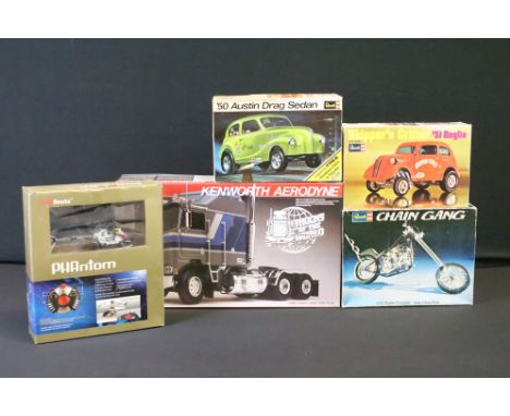 Four boxed Revell plastic model kits to include Trucks Of The World 1/25 Kenworth Aerodyne (no. 7413 - unbuilt with instructi