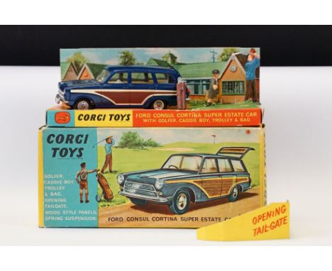 Boxed Corgi 440 Ford Consul Cortina Super Estate Car diecast model complete with 2 x figures, golf bag and trolley, diecast e