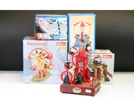 Four boxed Wilesco models to include M 70 Roundabout, M 78 Ferris wheel, M99 Drehorgel barrel organ and M85 Barrel Organ Grin