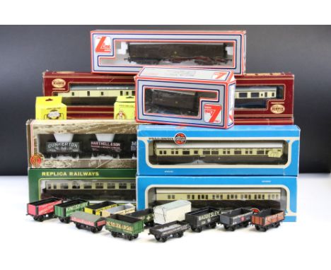 12 Boxed OO gauge items of rolling stock to include 8 x Airfix, 2 x Lima, 1 x Replica and a Bachmann 33029 Coal Trader Classi