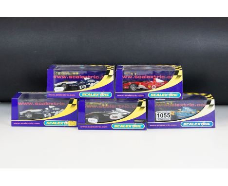 Five boxed / cased Scalextric slot cars to include C2667 McLaren Mercedes F1 MP4 16 No 10, C2677 Ferrari F2004 No 2, C2646 BM