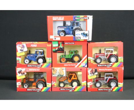 Seven boxed Britains 1:32 scale diecast model tractors to include 9508 Ford TW 25 Tractor, 9522 Renault tractor, 9520 Massey 