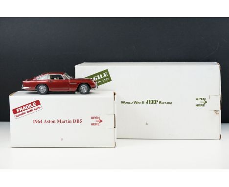 Two boxed Franklin Mint diecast models to include World War II Jeep Replica and 1964 Aston Martin, both ex