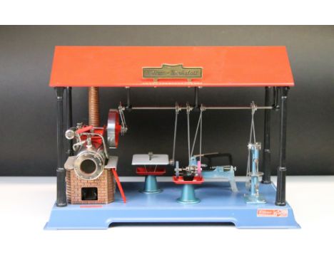 Boxed Wilesco Steam Engine with work station ' Dampfmaschine mit Werkstatt D 141'. Part of station slightly worn, box tatty.