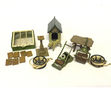 Selection of Britains Miniature Garden Series items, c.1930's, comprising: 010 Sundial; 2 x 068 Hose Reel, with string Hose a
