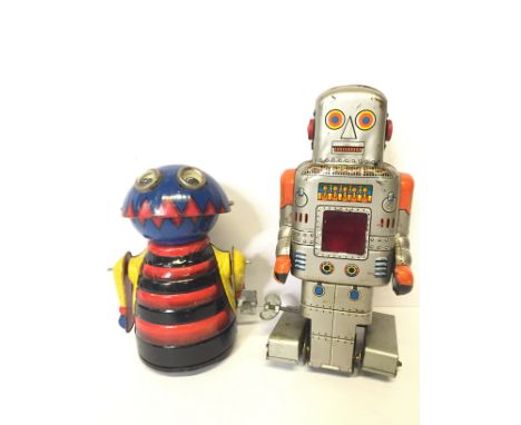 Marx Toys (Japan) Tinplate Clockwork Robot, height 13cm (motor inoperative), together with a Yoneya (SY, Japan) Robot With Sp