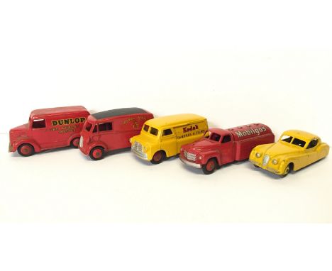 Four Dinky Toys commercial models: 440 Mobilgas Tanker; 260 Royal Mail Van; 480 Kodak Bedford Van; 451 Dunlop Trojan Van. Tog