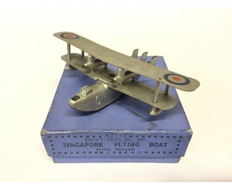 Dinky Toys 60h Singapore Flying Boat with Roller: tinplate wings, four two-blade propellers, silver with RAF roundels and red