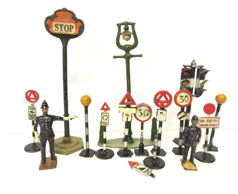 Selection of road furniture and signs by Johillco, Dinky and others, includes Johillco 'Stop' sign and a double traffic light