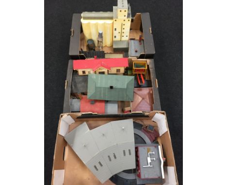Three trays of HO plastic kit built American Outline buildings, together with a Roundhouse engine shed and a Triang electric 