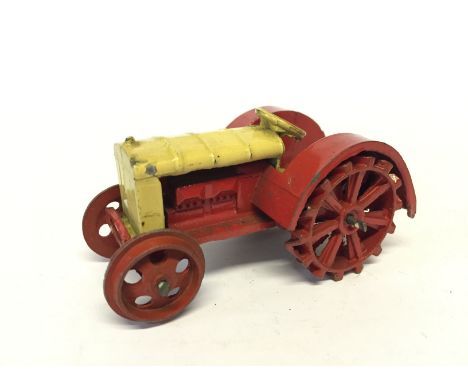 Dinky 22e Pre-War Farm Tractor: red and cream, red metal wheels, tow hook. Overall G.