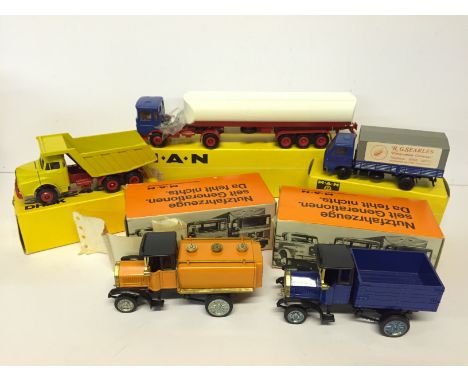 Five Conrad (Germany) MAN 1/50 scale die-cast models: No.3122 Tanker; No.3137 Truck; No.3135 Dumper Truck; Old Timer Tanker; 