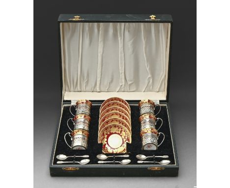 A set of six Hammersley claret ground and gilt bone china coffee cups and saucers with pierced silver cup holders, mid 20th c