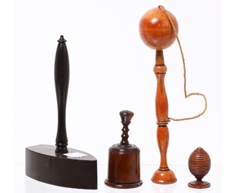 Treen. Four turned objects, first half 19th c, comprising a rosewood glove powderer, pine cup-and-ball toy, boxwood egg-shape