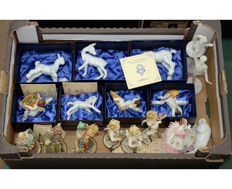 Miscellaneous continental porcelain figurines, 20th c, including Goebel male and female dancers, Capodimonte cupid with cheru